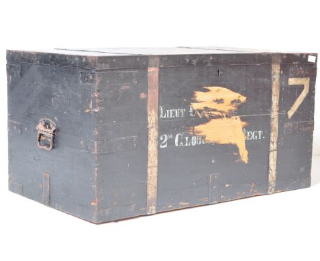 A 19th century Victorian ebonised pine military steamer trunk&nbsp; of rectangular form having a hinged lid opening to reveal