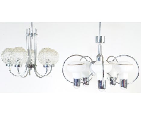 A mid century chrome and milk glass 5 branch retro chandelier / electrolier together with another 5 branch electrolier having