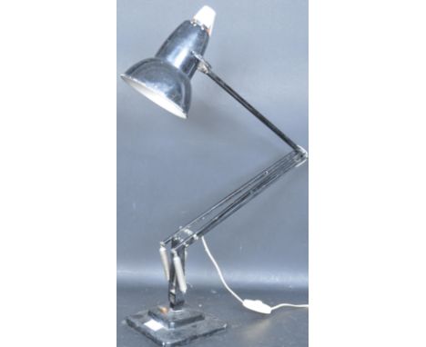 A 20th Century circa 1940's Industrial pre-war Herbert Terry anglepoise lamp, raised on a cast metal two step base with penda