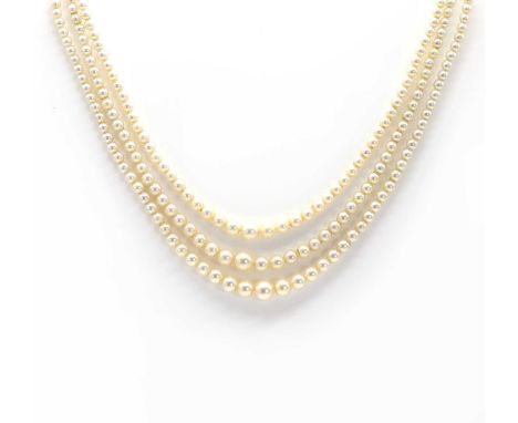 A cased three row graduated pearl necklace with an old European diamond set clasp,untested, three rows of graduated cultured 