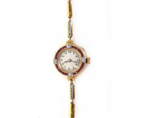 A French ruby, diamond and 18ct gold cocktail watch, the circular champagne dial with black Arabic numbers, chemin-de-fer rin