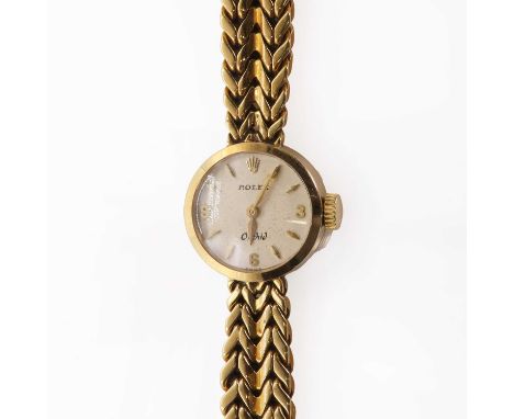 An 18ct gold ladies' Rolex Orchid mechanical bracelet watch,a circular case, 16mm diameter, a silvered dial with applied gilt