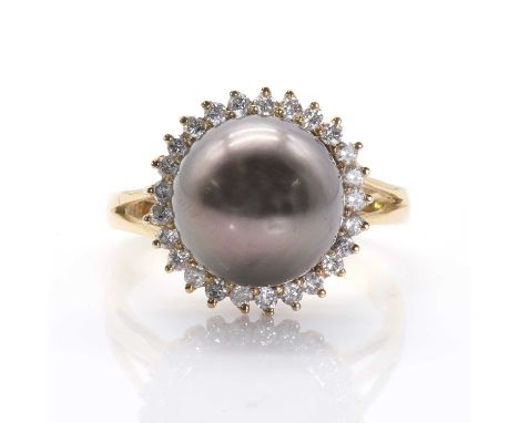 A Tahitian cultured pearl and diamond cluster ring, centred by an 11.70mm circular Tahitian cultured pearl, untested, encircl