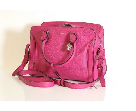 An Alexander McQueen fuchsia pink pebbled calfskin tote,dual rolled handles and detachable shoulder strap, silver-tone hardwa