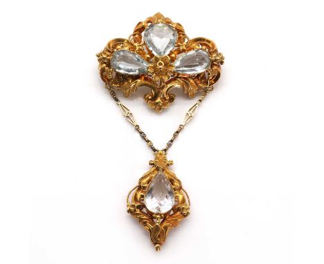 A Victorian aquamarine and rock crystal pendant brooch, with three pear cut aquamarines in sunrise formation, pinch collet se