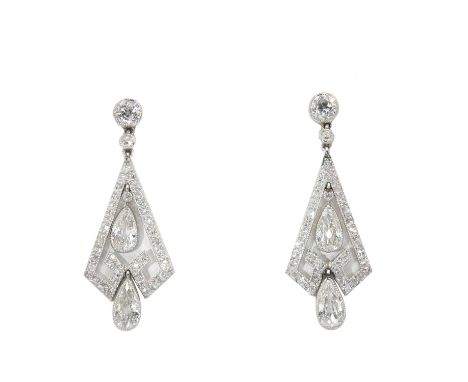 A pair of Art Deco diamond pendant earrings, each post headed by an old round brilliant cut diamond in millegrain edged colle