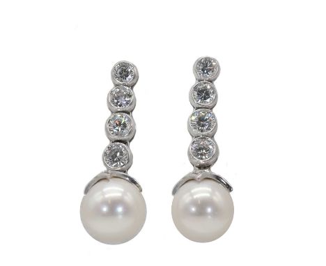 A pair of 18ct white gold cultured pearl and diamond drop earrings, a line of graduated round brilliant cut diamonds each col