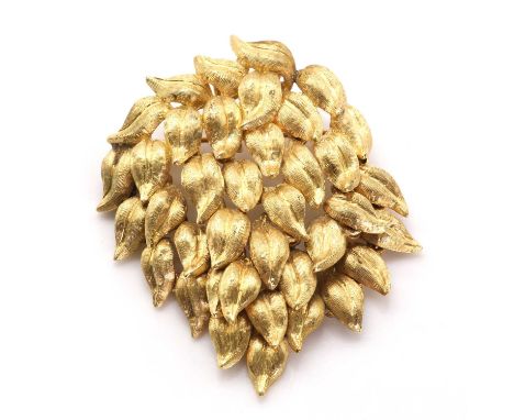 A gold foliate design brooch/pendant, by Cellino,of textured foliate design, the upper half fixed and the lower half articula