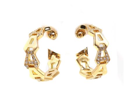 A pair of 18ct gold diamond set Asprey 'Signature' design hoop earrings, c.2006,with a series of pierced capital letters, alt