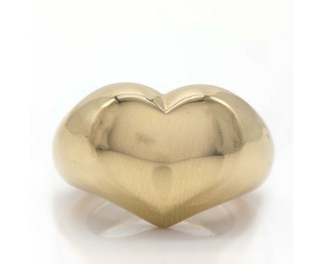 An 18ct gold Chevalier Coeur ring, by Chaumet, the polished and raised heart shaped front section tapering into the rolled sh