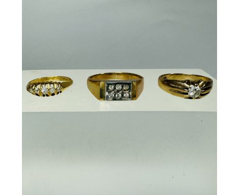 Three gold and diamond rings. Comprising a gentleman's 9ct gold ring, set with six round brilliant cut diamonds, each of an e