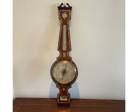 A Regency mother of pearl inlaid rosewood barometer with hydrometer above thermometer and dial. The level signed L Bernascone