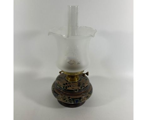 A Doulton Lambeth Victorian oil lamp of squat form, marked EDL for Edith D Lupton (decorated for Doulton 1876-89) with glass 