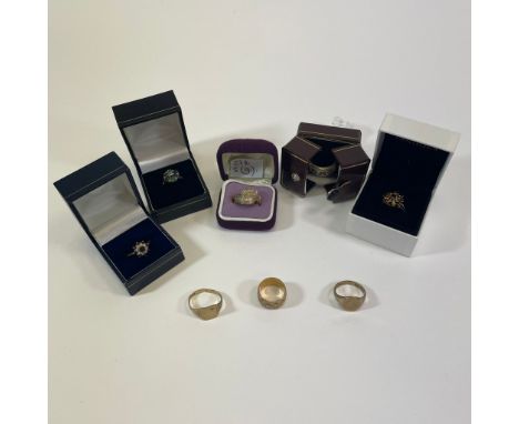 A collection of 9ct gold rings. Comprising a 9ct yellow gold garnet and opal cluster ring, size P; a 9ct gold signet ring wit