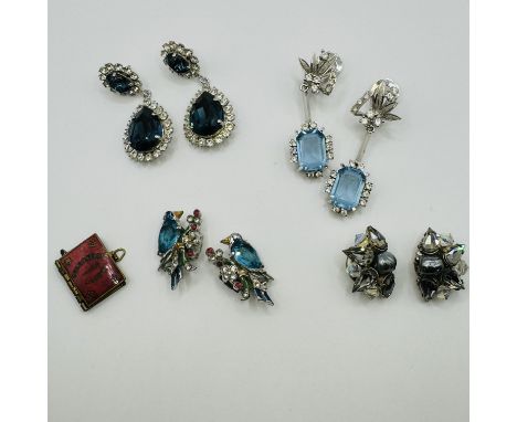 A pair of vintage "Crown" Trifari enamel and rhinestone exotic bird ear clips, along with three other pairs of vintage and co