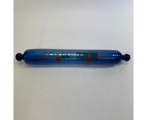 18th Century Green glass onion shaped bottle together with a 19th Century Blue glass rolling pin.