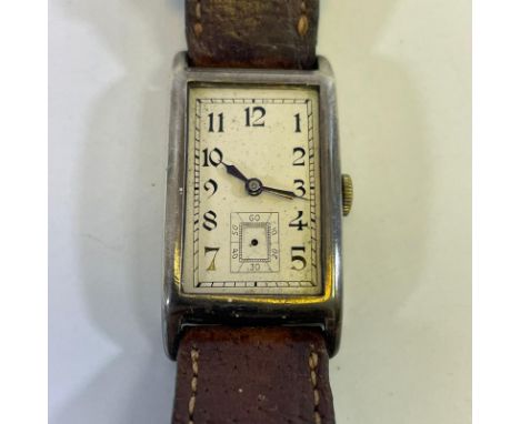 A gentleman's silver Omega manual wind wristwatch. Case number 7665330. Running but missing glass and second hand.