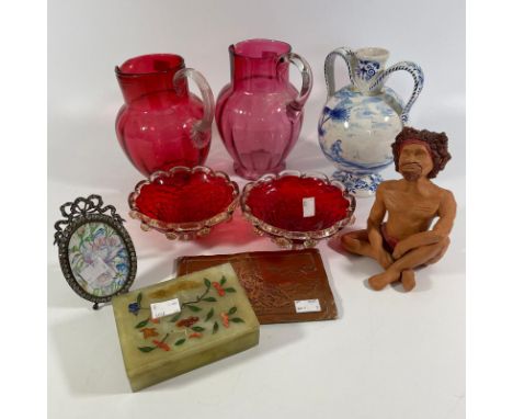 A collection various glass ceramics, collectables including two cranberry glass jugs, two glass bowls, Delft vase, copper pla