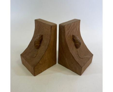 A pair of Robert Thompson "Mouseman" bookends. Approximately 9.5cm by 9.5cm. Slight cracking but generally good