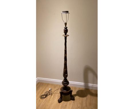 A Walnut standard lamp with gilt acanthus and vine carved gilt decoration.&nbsp; 170cm tall.&nbsp; Generally good condition w