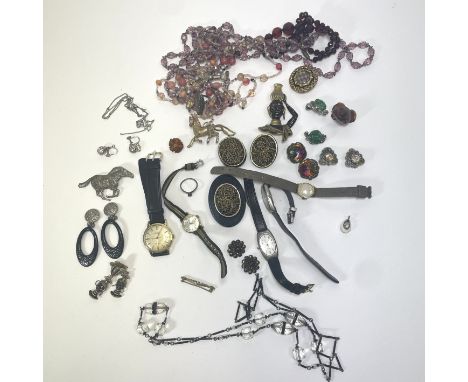 A collection of antique and vintage costume jewellery to include beads, watches, an hair work mourning brooch and a cowrie sh