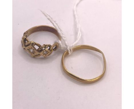 An 18ct yellow gold three stone diamond ring. Size O. Approximately 4.5 grams. Reasonably good, minor usage and a 22ct yellow