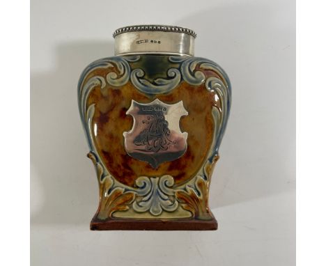 A Victorian Doulton Lambeth Acanthus decorated tea caddy and silver top and shield. Chester 1895/96 CS FS. Cornelius Desormea