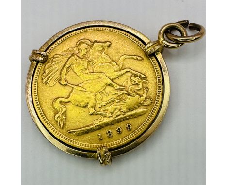 A Victorian half sovereign coin in a hallmarked 9ct yellow gold pendant clip mount. "Veil head" portrait of Victoria, 1899, w