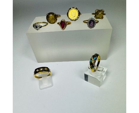 A collection of eight gold dress rings. Including a unmarked precious yellow metal amethyst and diamond cluster ring, testing