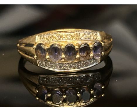 9ct Gold ring set with chip diamond & sapphire  2.7g Size U
