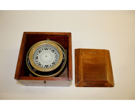 MARINE GIMBLE COMPASS a brass cased Marine gimble compass, in a fitted wooden case. Dial 4ins (10cms) diameter