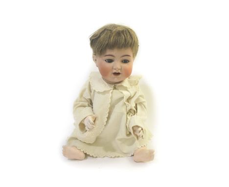 LARGE SIMON & HALBIG FOR KAMMER & REINHARDT DOLL with weighted blue eyes and open mouth with tongue, and with a bent limb com