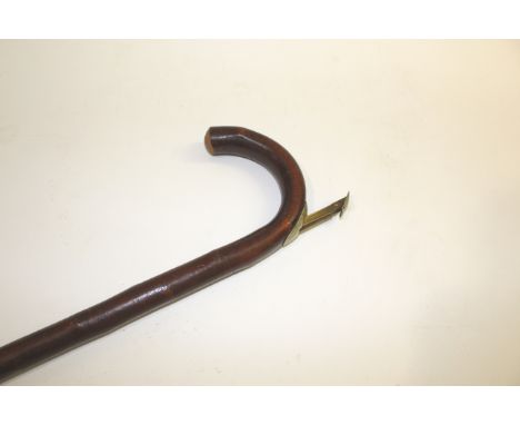 HORSE MEASURING WALKING STICK a wooden walking stick with a small catch on the handle which opens to reveal a measuring stick