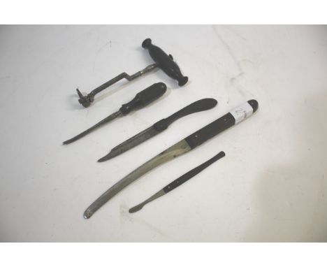 DENTAL & SURGICAL TOOLS including a dental tooth key and tooth elivator, both with ebony wooden handles. Also with a small su