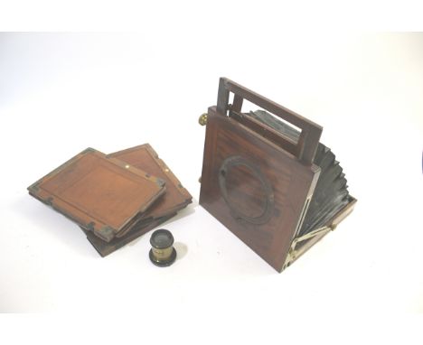 PLATE CAMERA a mahogany plate camera with a Busch's Rapid No 3 brass lens, and with some wooden plates.