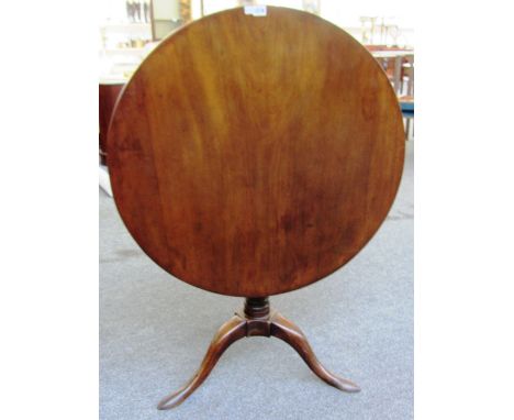 A 18th century mahogany circular snap top occasional table with bird cage support on tripod base, 82cm wide. 