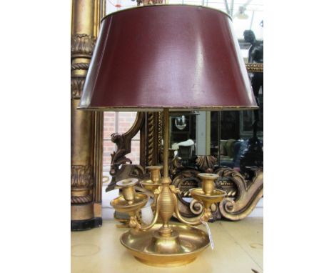 A gilt bronze biloute table lamp, late 20th century, with swan neck finials over an adjustable rouge tin shade, the central c