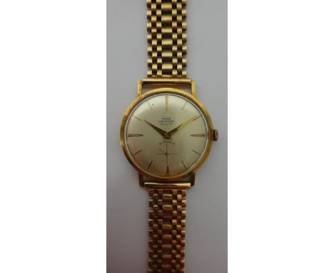 A gentleman's 18ct gold circular cased Swiss Emperor De Luxe wristwatch, with an unsigned jeweled lever movement, detailed Sw