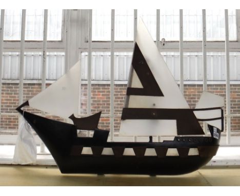 An unusual Arts & Crafts style wall light, 20th century, modelled as a sailing ship with painted hull, brass embellishments a
