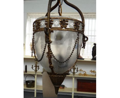 A gilt brass and etched glass ceiling light, early 20th century, the three serpent supports suspending a foliate pierced circ