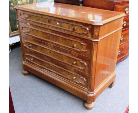 A 19th century Continental walnut four drawer commode with geometric moulded decoration on bun feet, 118cm wide. 
