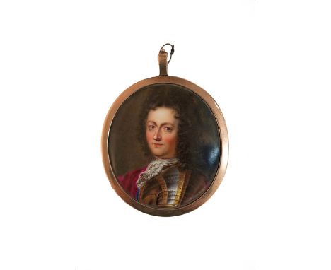 A gold mounted oval ceramic portrait miniature, decorated with the portrait of a gentleman wearing ceremonial armour in the 1