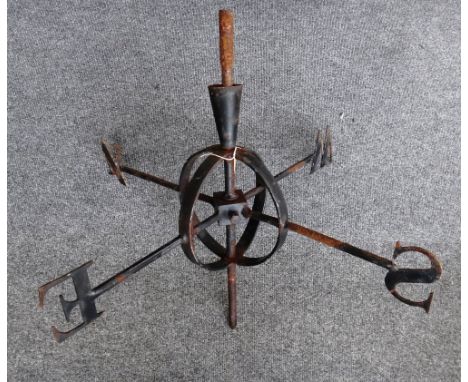 A 20th century black painted iron weather vane depicting two long dogs coursing a hare.