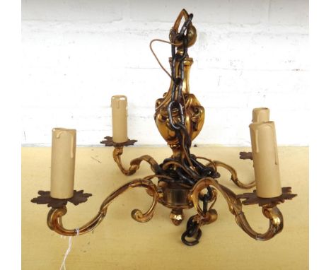 A rococo style gilt bronze four branch chandelier, 20th century, with scroll arms and foliate finial, 27cm high. 