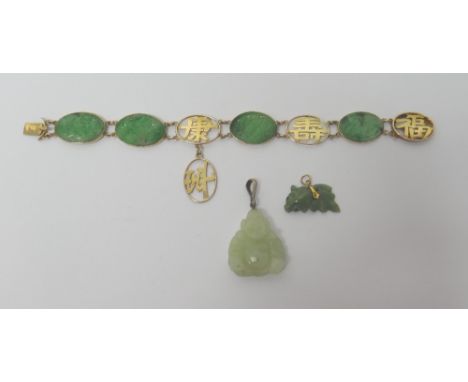 An Oriental gold mounted, carved jade panel link bracelet, mounted with four carved and pierced oval jade panels and with fou