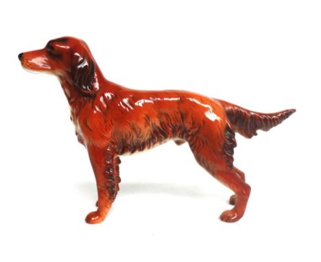 Twelve Goebel porcelain animals, comprising; eight dogs, two Shetland ponies, a donkey and a monkey, the tallest 17.5cm high 