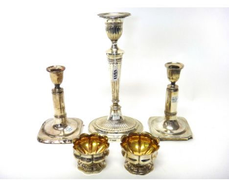 A silver table candlestick, of Adam style, with partly fluted decoration in the neo-classical taste, on an oval base, Sheffie