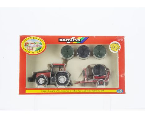 Britains boxed set 09673 Valtra Valmet 8750 Tractor and Volac 820 Bale Wrapper Gift Set,  contents VG, box very slightly warp