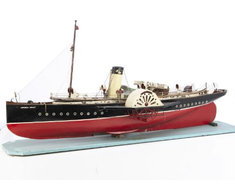 A  large scale model of  the 'London Belle' Paddle Steamer, constructed in metal and wood with red and black hull, varnished 