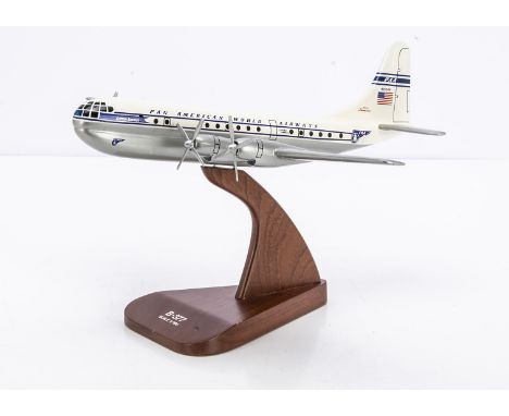 Model of a PAN-AM B-377 on Stand, a painted wooden model of a Pan American B377 1:100 on polished wood stand made in the Phil